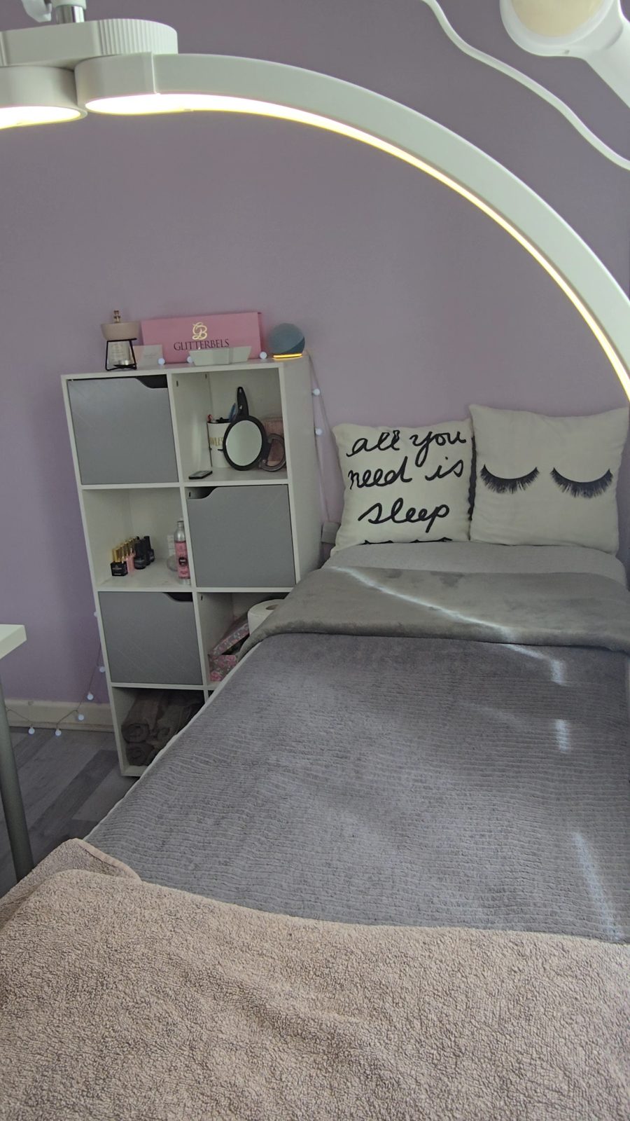 The lash room, with the bed and an all you need is sleep cushion