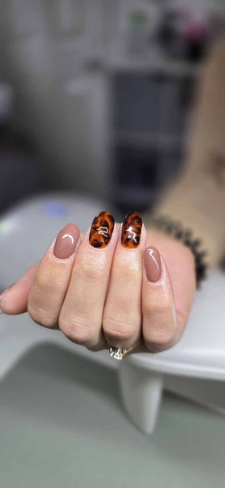 Nude nails with tortoiseshell accents