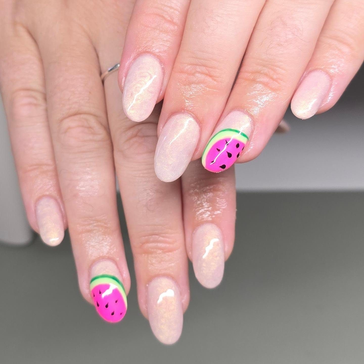 Pale pink nails with watermelon nail art